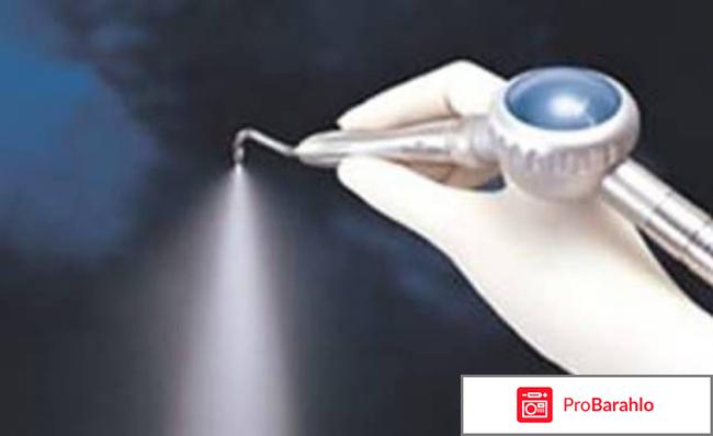 Чистка зубов аппаратом air flow 