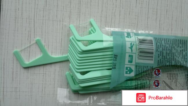 Одноразовая пластиковая зубочистка с зубной  нитью Flosstik Мята обман