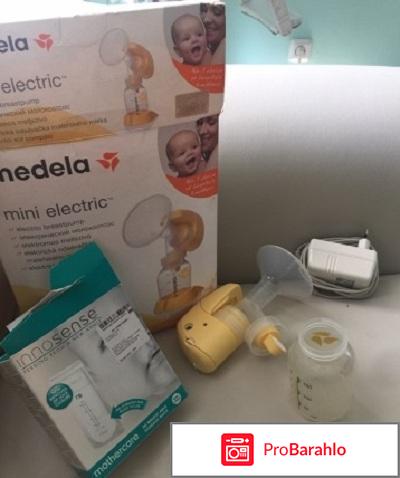 Молокоотсос Medela mini electric 